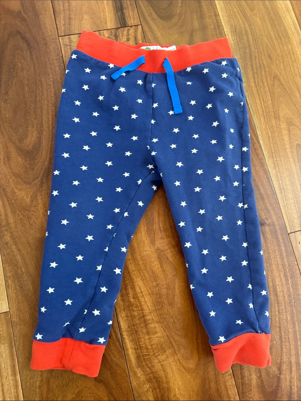 Baby Boden Navy Star Print Pajama Bottoms with Red Trim